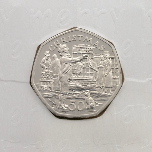 175 - Isle of Man, 1992 diamond BU Christmas 50p, Paper Boy. Packaging: unwritten Pobjoy Mint card with ce... 