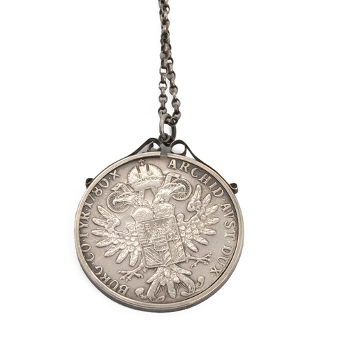 8 - Silver Marie Theresa mounted coin on a white metal necklace, along with a pair of silver bright-cut ... 