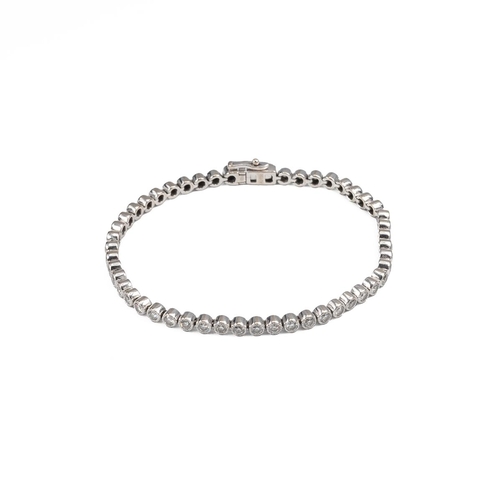 10 - A diamond tennis bracelet, set with 50 brilliant cut diamonds, totalling approximately 3.5 carats,  ... 