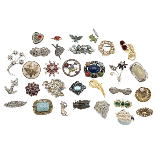 12 - Collection of vintage costume jewellery brooches, including some silver examples.