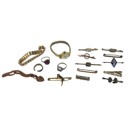 27 - Assorted costume jewellery, including necklaces, bracelet, brooches and other items.