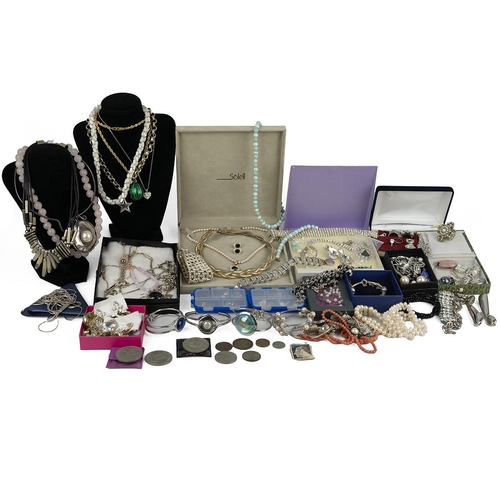 29 - Large collection of costume jewellery including various items, rings, necklaces, bangles, and other ... 