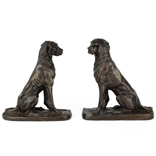 46 - Pair of 20th century bronze models of seated hounds, standing on rectangular bases, 22cm high.