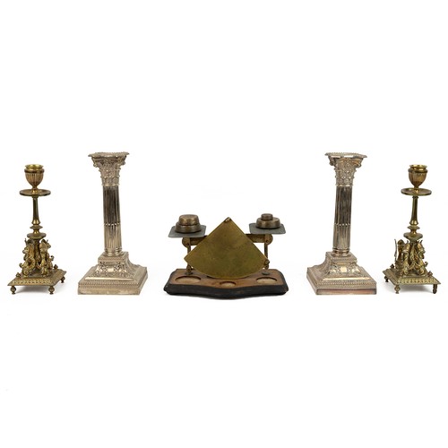 61 - Pair of Silver plated corinthian column candlesticks, pair of brass candle sticks with four griffins... 