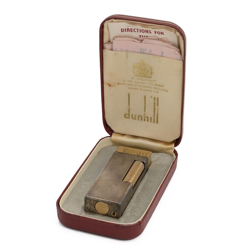 64 - Mid-century textured Dunhill lighter, with original box and paperwork.