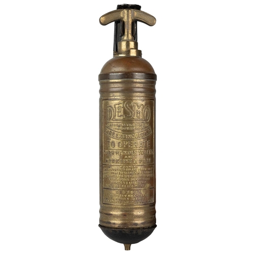 126 - Vintage brass Desmo fire extinguisher, mounted on black metal stand.