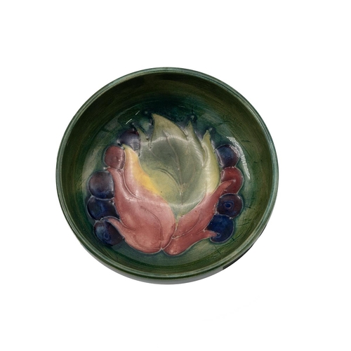 136 - Moorcroft - mid century 'Leaf and Berry' pattern pin dish, impressed mark to base. Diameter 7.5cm