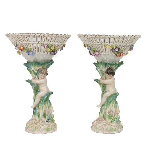 146 - Pair of 19th Century Dresden style funnel basket comports with putti or cherubim figures in parcel g... 