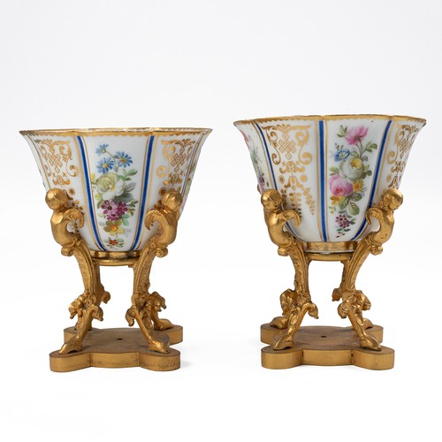 151 - Pair of hand painted porcelain floral pattern and parcel gilt cups, in the style of 18th Century Wor... 