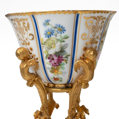 151 - Pair of hand painted porcelain floral pattern and parcel gilt cups, in the style of 18th Century Wor... 