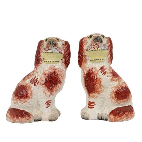 152 - Pair of good 19th Century Staffordshire dogs with flower baskets - typical spaniel form in red and w... 