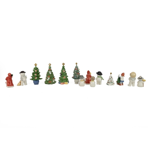 165 - Royal Copenhagen porcelain Christmas figurines to include; 5 x Christmas trees; 6 x snowmen; 2 x San... 