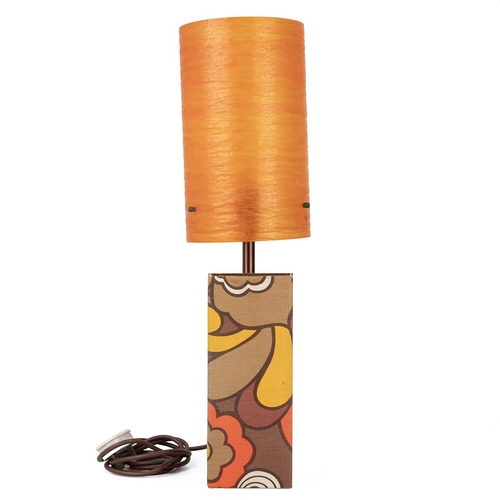 185 - Mid-century/vintage lamp, with an orange fibre glass shade, standing on a fabric-covered base, 58cm ... 