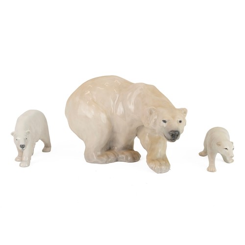 188 - Royal Copenhagen porcelain figurines of polar bears (x 3), the largest L 27cm, H 18cm each with prin... 