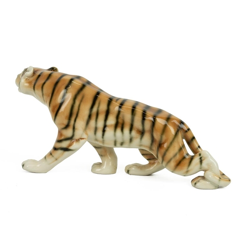 204 - Royal Dux porcelain figurine of a prowling tiger. 32cm length