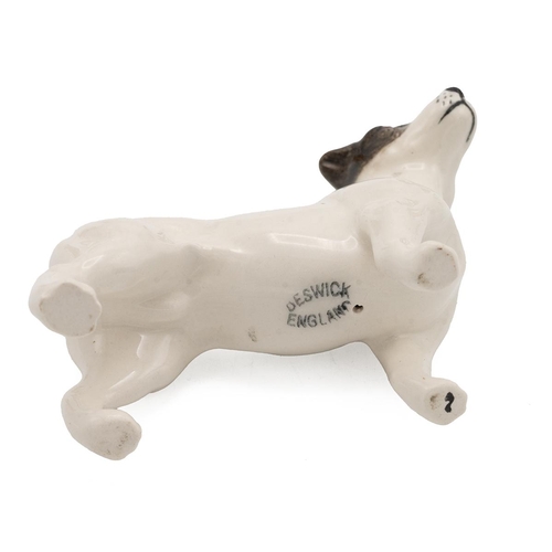 205 - Beswick porcelain figurines of dogs to include a corgi, bulldog, two cocker spaniels, Airedale terri... 