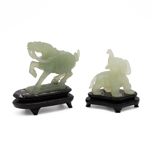 323 - Jade figure of an elephant and a horse, two carved figures both with wooden bases, H8cm