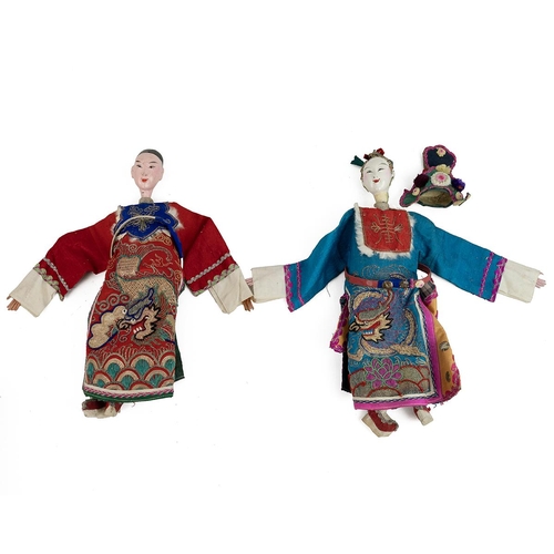 368 - 2x antique Chinese dolls, early 20th Century. Male & female, each dressed in dragon embroidered ... 