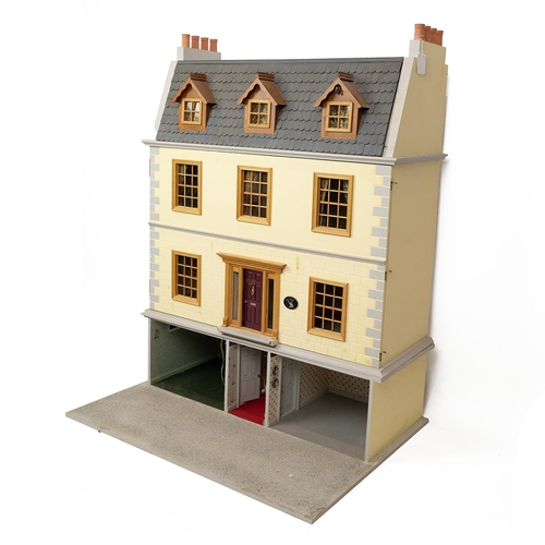 377 - Large wooden dolls house and contents. Modelled as a Georgian town house, 4 storeys, front opens to ... 