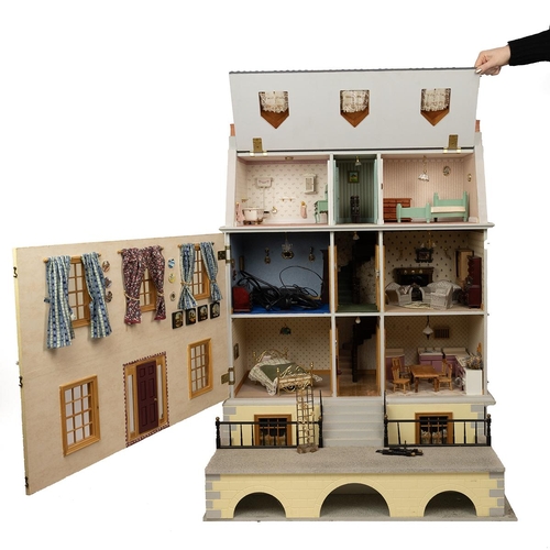 377 - Large wooden dolls house and contents. Modelled as a Georgian town house, 4 storeys, front opens to ... 