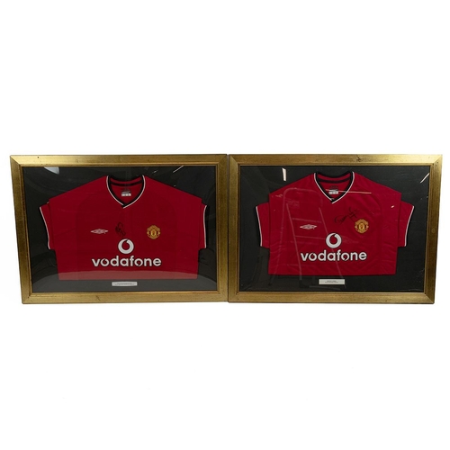 396 - Manchester United - Two signed signed football shirts, Ole Gunnar Solskjaer and Dwight Yorke, framed... 