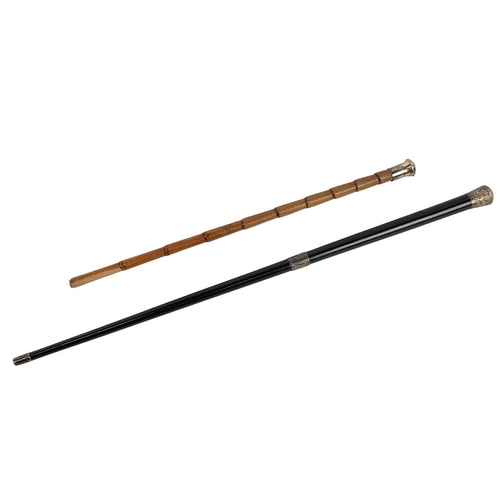 416 - Two conductor's batons and a metronome. The first by Callow and Sons, of carved to appear as bamboo,... 