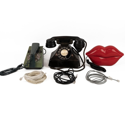 437 - Three retro and vintage telephones to include a red 'Hot Lips', a two-tone green spin dial 'Trim Pho... 