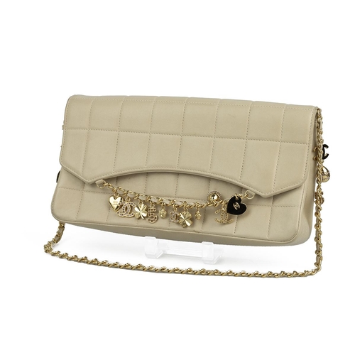 458 - Chanel chocolate bar quilted lambskin charm handbag, circa 2002-2003, in light tan/cream.Serial no. ... 