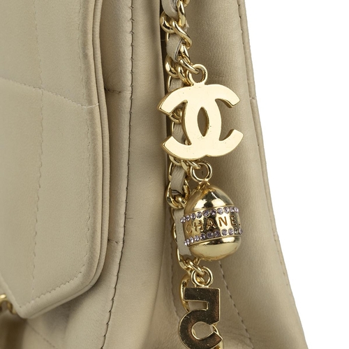 458 - Chanel chocolate bar quilted lambskin charm handbag, circa 2002-2003, in light tan/cream.Serial no. ... 