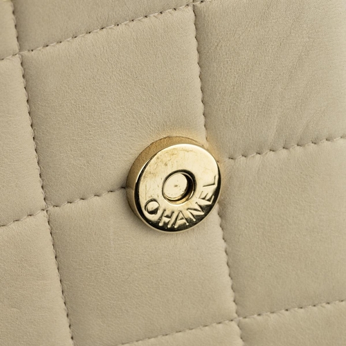 458 - Chanel chocolate bar quilted lambskin charm handbag, circa 2002-2003, in light tan/cream.Serial no. ... 