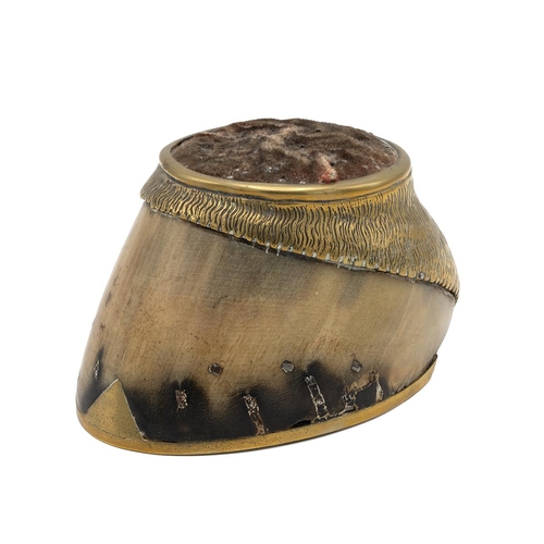 467 - Brass mounted horse hoof pin cushion with velvet covered top. H 8cm, L 14.5cm.