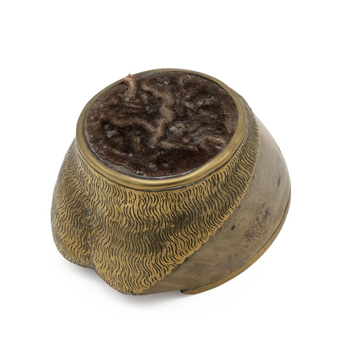 467 - Brass mounted horse hoof pin cushion with velvet covered top. H 8cm, L 14.5cm.