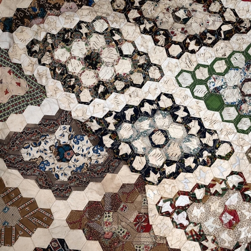 471 - 19th century patchwork quilt section, c1870s-1890s, of hexagonal form, 229cm x 124cm wide, along wit... 