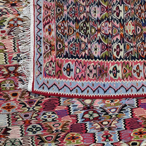 472 - A Persian Kilim Senneh hand spun and knotted and crafted by hand in Old Persian tradition from natur... 