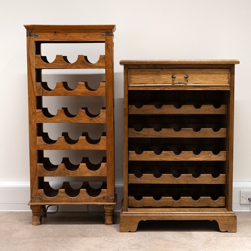 486 - Two free standing wooden wine racks, an Ash with single drawer above  five sliding wine trays 5 bott... 