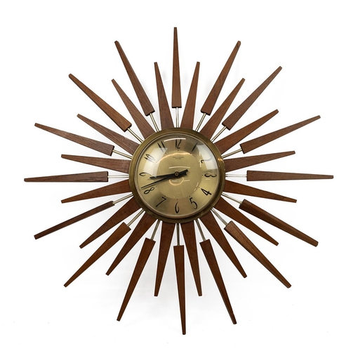 500 - Mid Century 1960s Sun Burst Teak Clock. Quartz movement, maker Anstey & Wilson. Diameter 63cm.