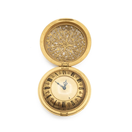 501 - Jaeger Lecoultre travel alarm clock in pierced gilt brass Baroque style case, opening to reveal a gi... 