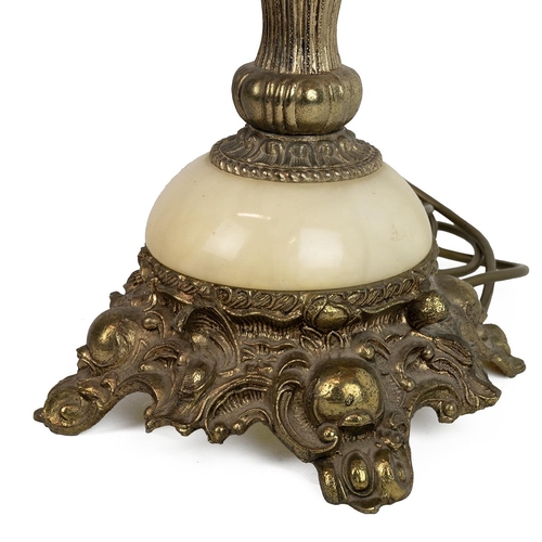 507 - Tall onyx and gilt brass table lamp with a cherub to the column with a bell shaped pink tassled shad... 