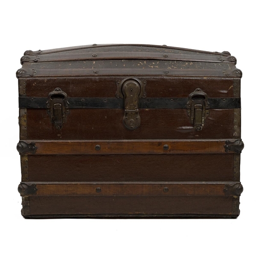 511 - Domed top trunk of lath and canvas construction, with medal bonding and leather carry straps, the la... 