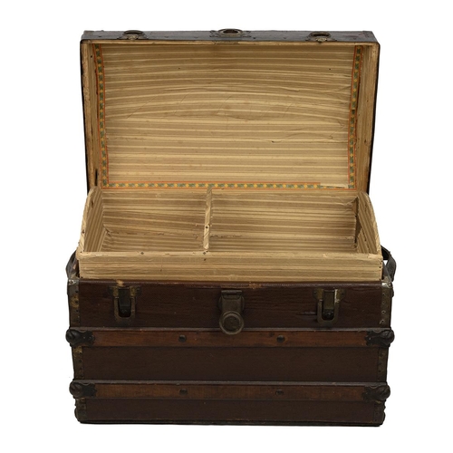 511 - Domed top trunk of lath and canvas construction, with medal bonding and leather carry straps, the la... 