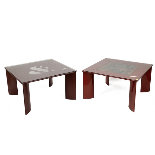 516 - Two retro glass topped industrial letters square coffee tables one burgundy and the other red raised... 