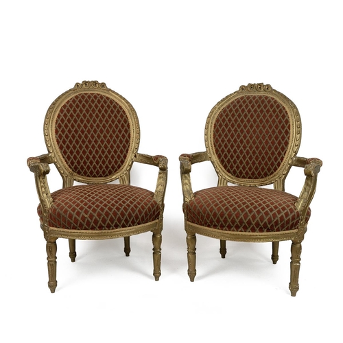 517 - Pair of French style gilt framed armchairs with oval padded back rest and over stuffed seats, the cu... 