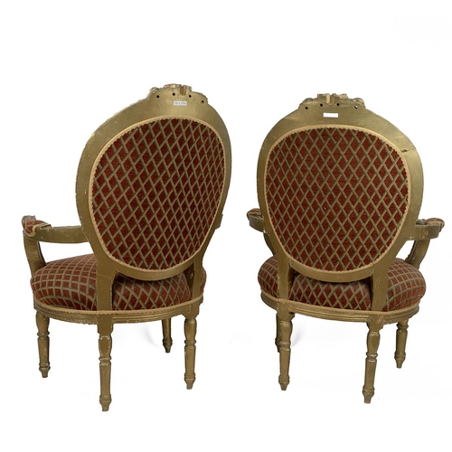 517 - Pair of French style gilt framed armchairs with oval padded back rest and over stuffed seats, the cu... 