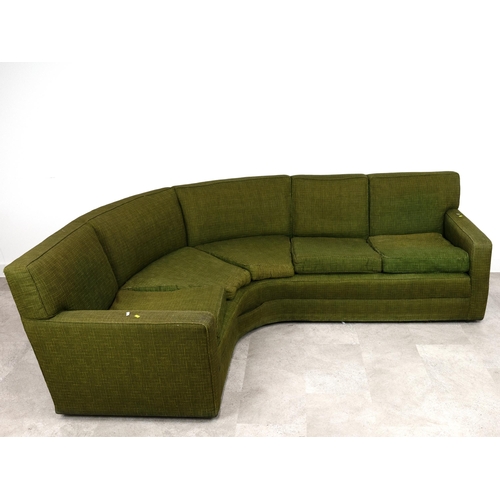 521 - Mid-century/vintage sofa of curved form, upholstered in original green fabric, seating five, 71cm hi... 