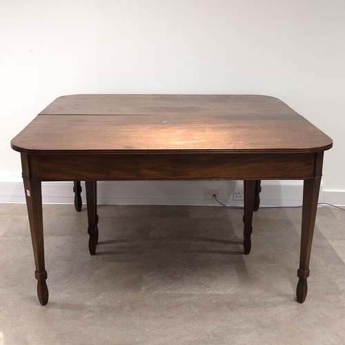 534 - 19th Century mahogany 8-10 seat dining table. One drop in leaf is original to the table creating an ... 