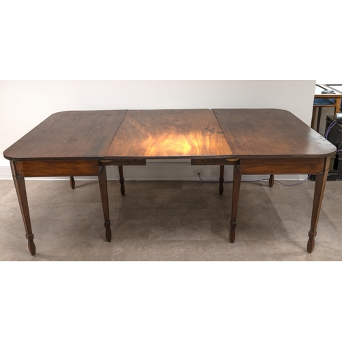 534 - 19th Century mahogany 8-10 seat dining table. One drop in leaf is original to the table creating an ... 