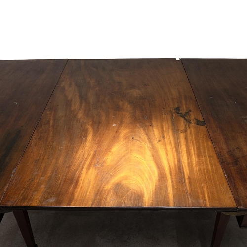 534 - 19th Century mahogany 8-10 seat dining table. One drop in leaf is original to the table creating an ... 