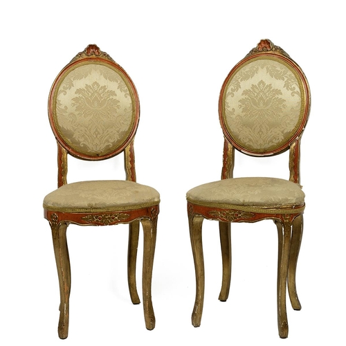 536 - Pair of Italian gilt-wood side chairs. Carved detailing to the legs and top, orange detailing over t... 