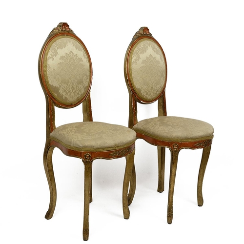 536 - Pair of Italian gilt-wood side chairs. Carved detailing to the legs and top, orange detailing over t... 