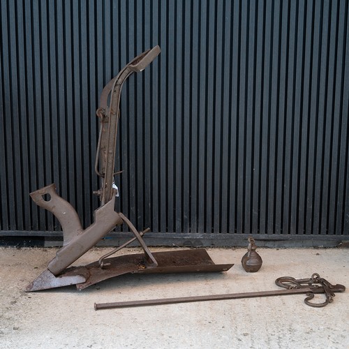 548 - Vintage cast iron Italian hand plough, along with a set of iron grain sack scales.